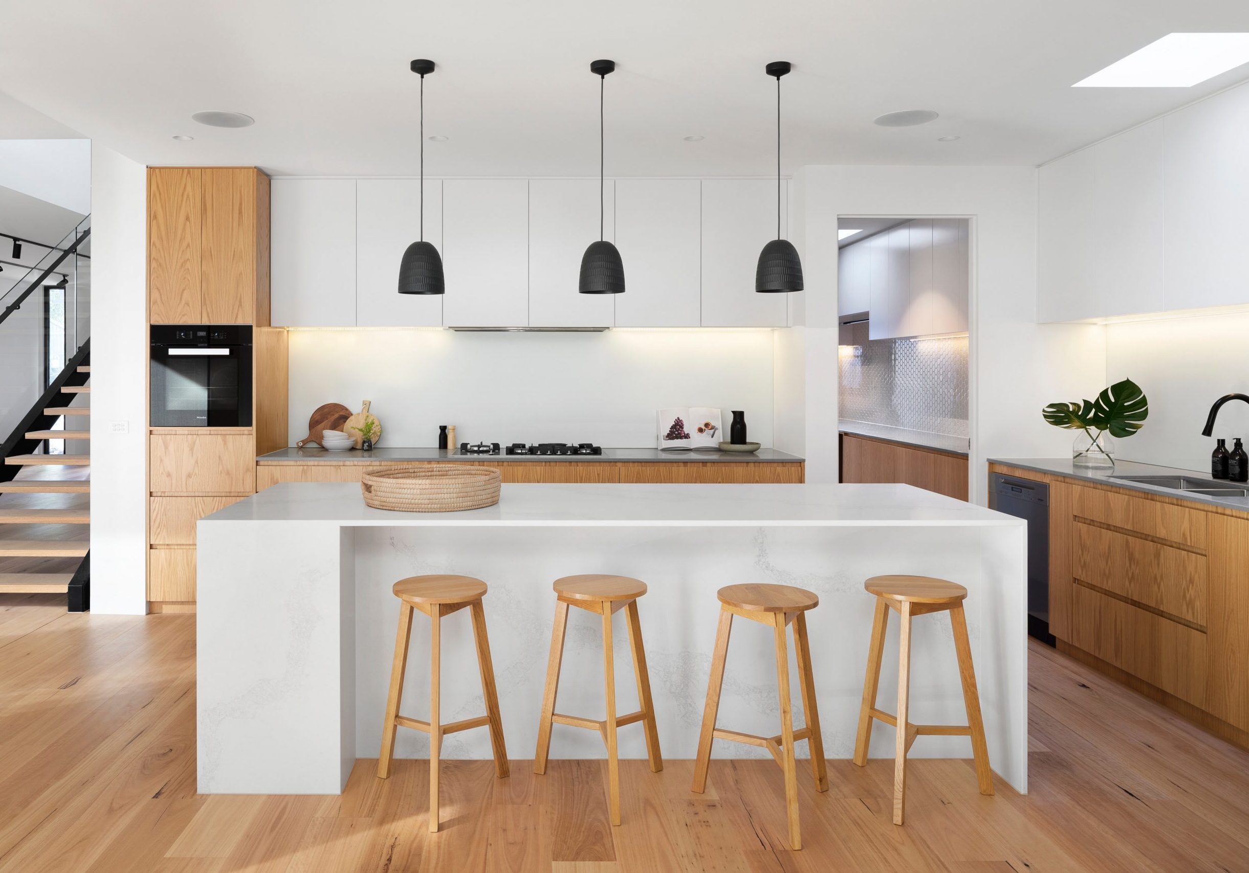 Modern Kitchen area with island and pendant lights
